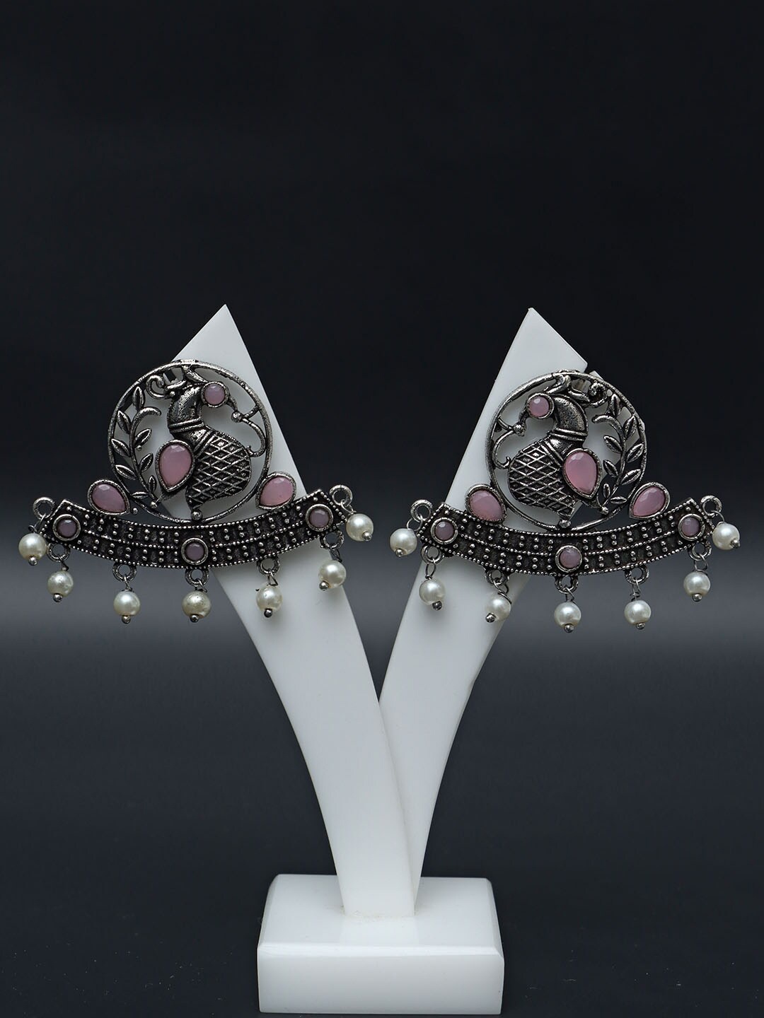 

Ozanoo Silver-Plated Peacock Shaped Floral Studs Earrings