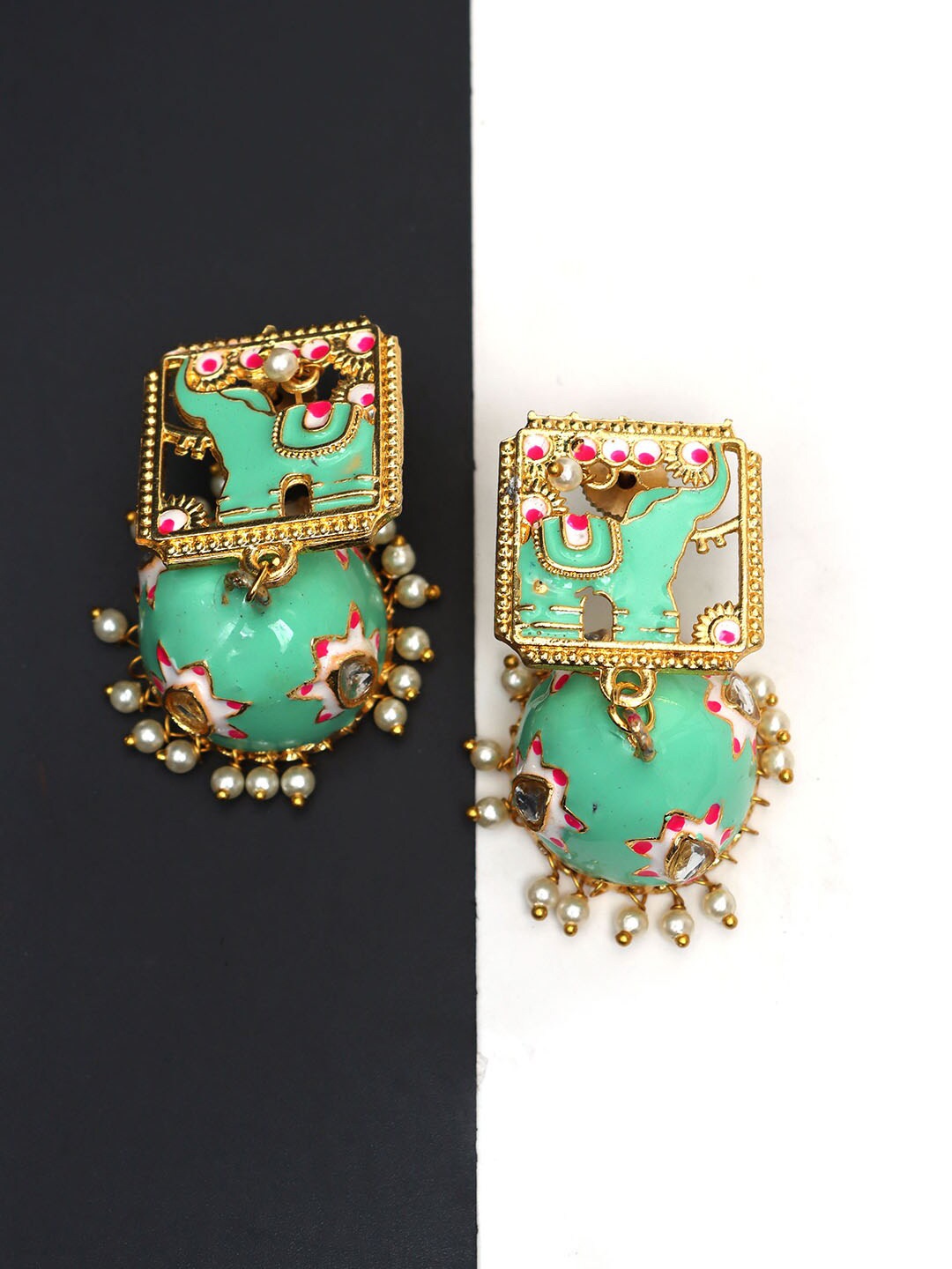 

Ozanoo Gold-Plated Dome Shaped Jhumkas Earrings