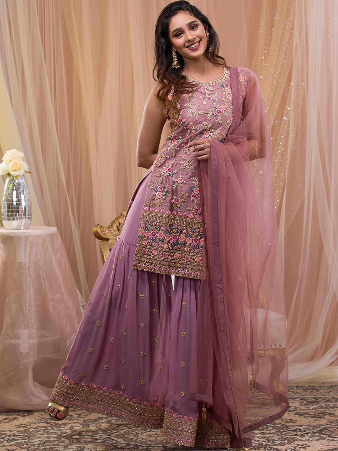

Koskii Floral Embroidered Sleeveless Zari Kurti With Sharara & Dupatta, Lavender