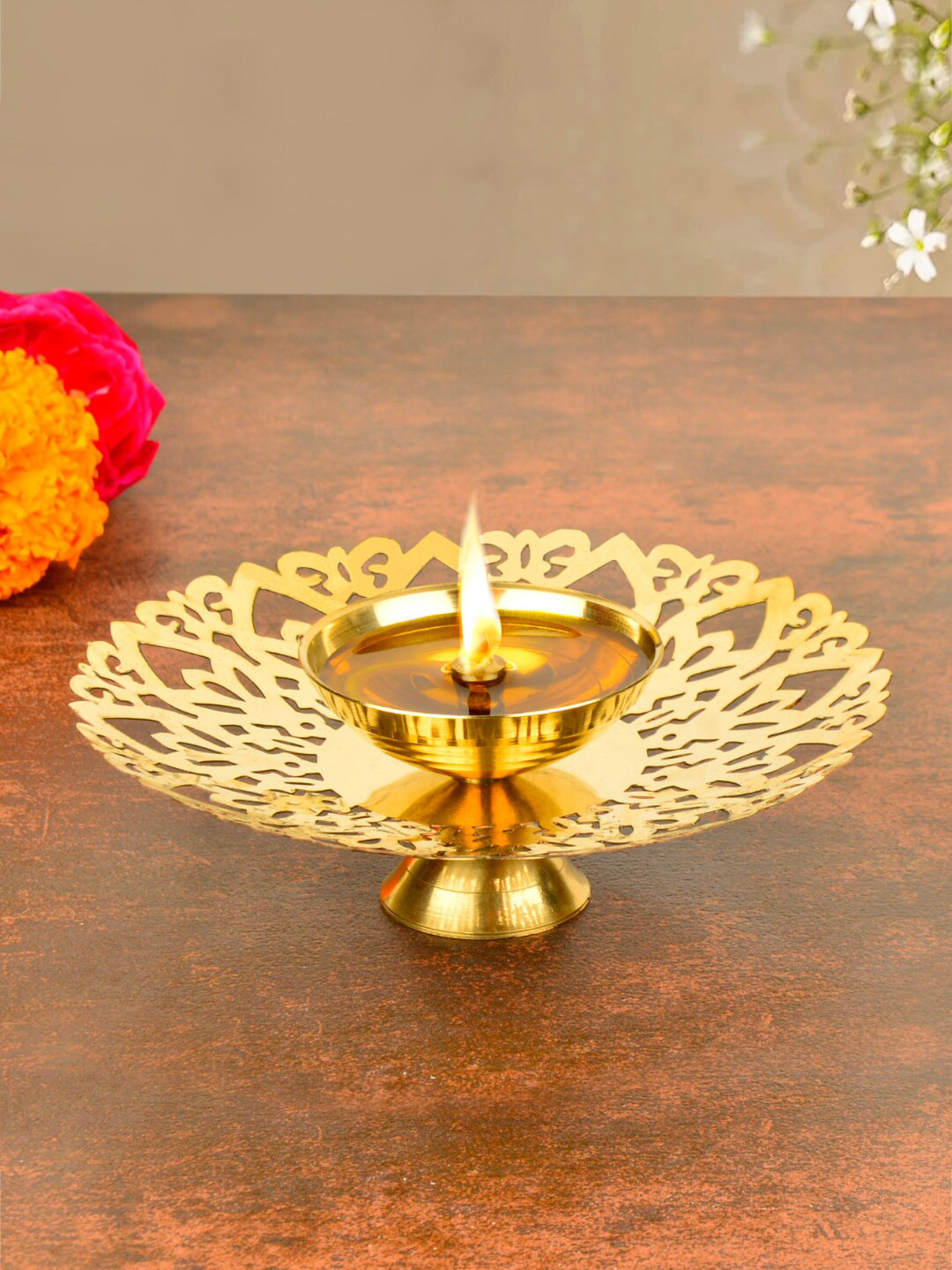 

StyleMyWay Gold Toned Textured Brass Cutwork Pooja Diya