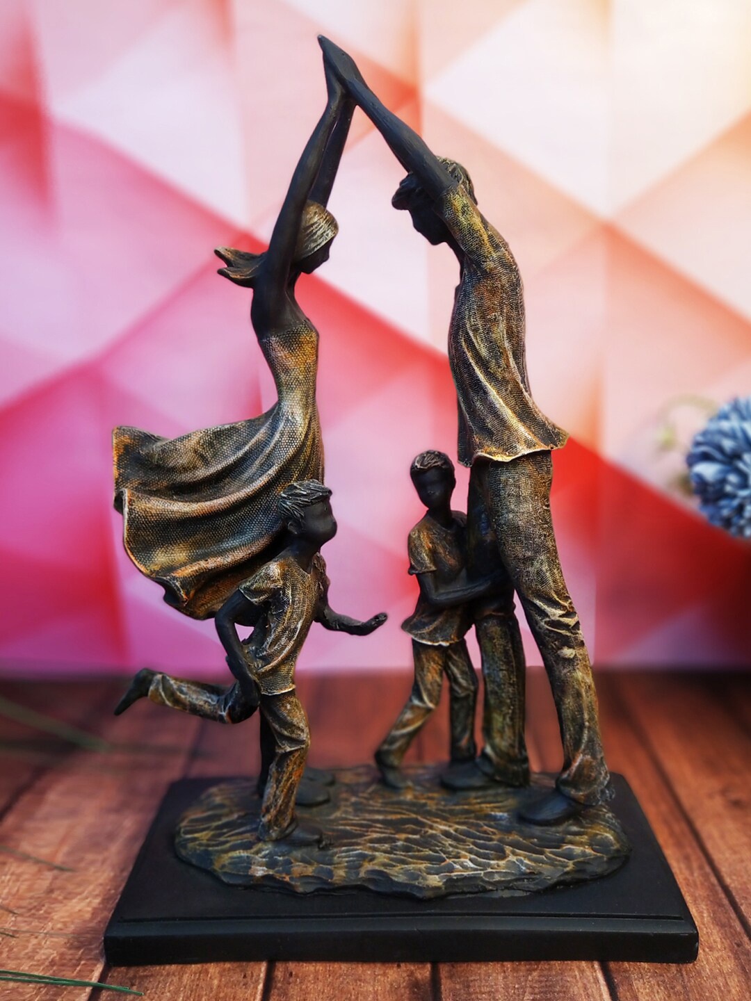 

WENS Black & Beige Family Figurine Showpiece