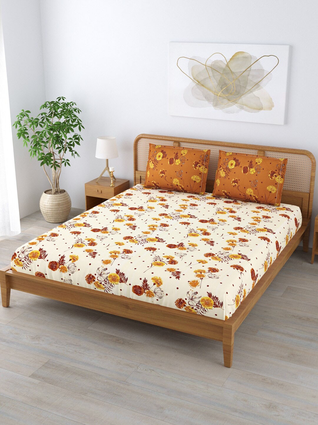 

Clasiko Yellow & Brown Floral 180 TC Cotton King Bedsheet With 2 Pillow Covers