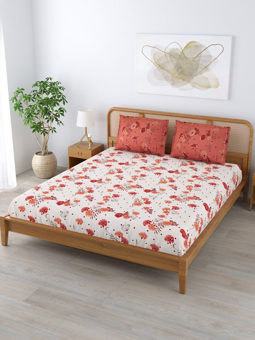 

Clasiko Orange & Cream Floral 180 TC Cotton King Bedsheet With 2 Pillow Covers