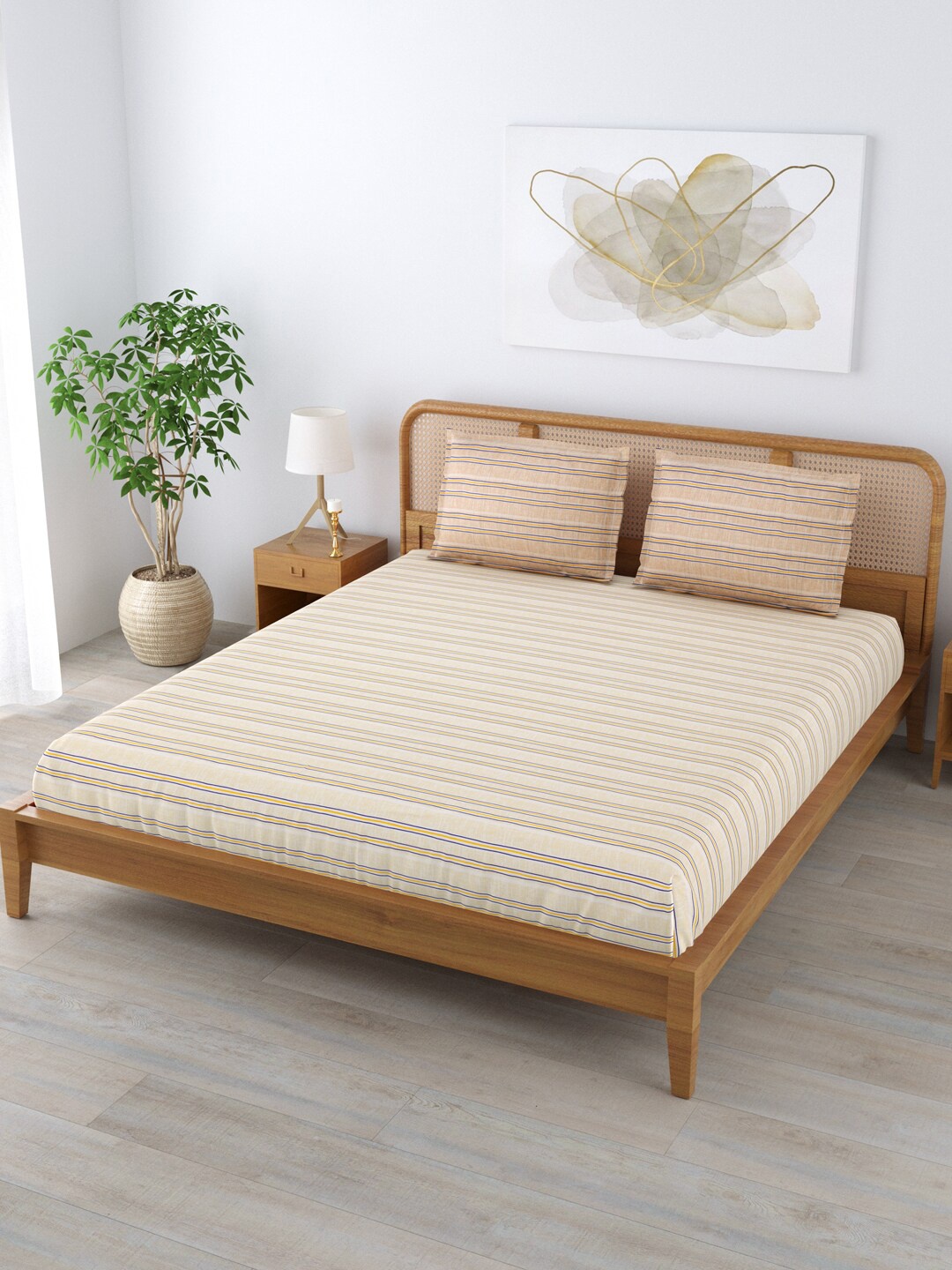 

Clasiko Yellow & Blue Striped 180 TC Cotton King Bedsheet With 2 Pillow Covers