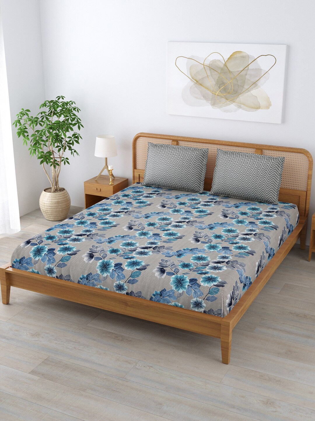 

Clasiko Blue & Grey Floral 180 TC Cotton King Bedsheet With 2 Pillow Covers