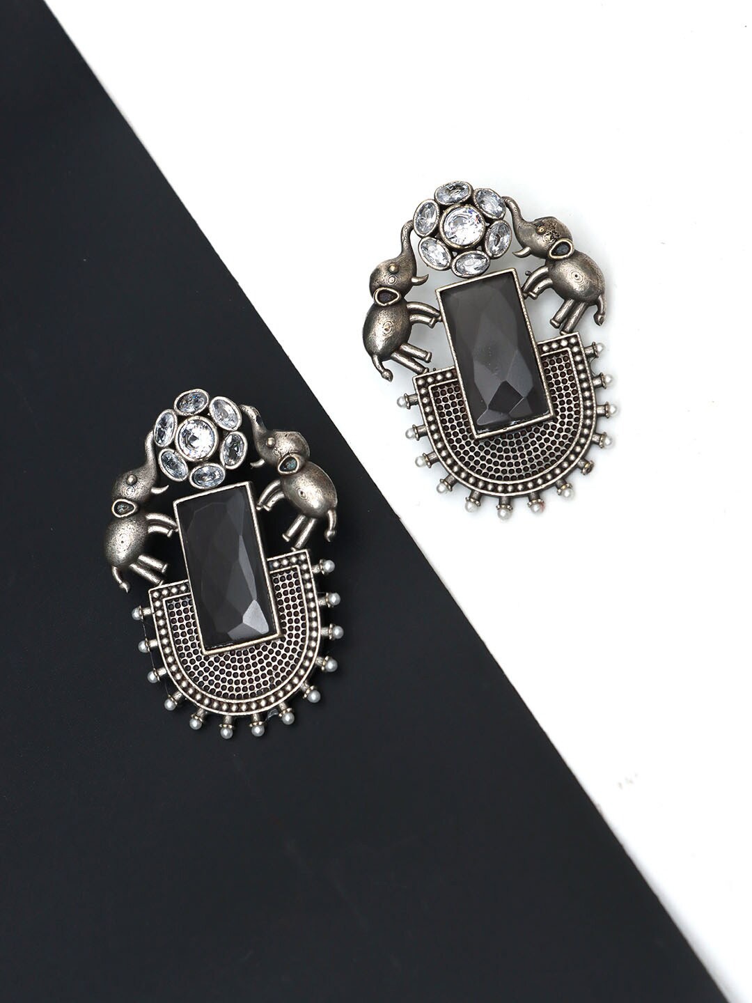 

Ozanoo Silver-Plated Elephant Shaped Studs Earrings