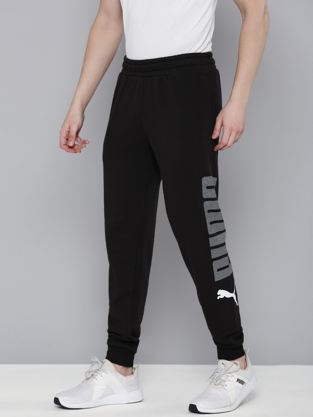 

Puma Men Printed Essentials+ Logo Lab Mid-Rise Joggers, Black