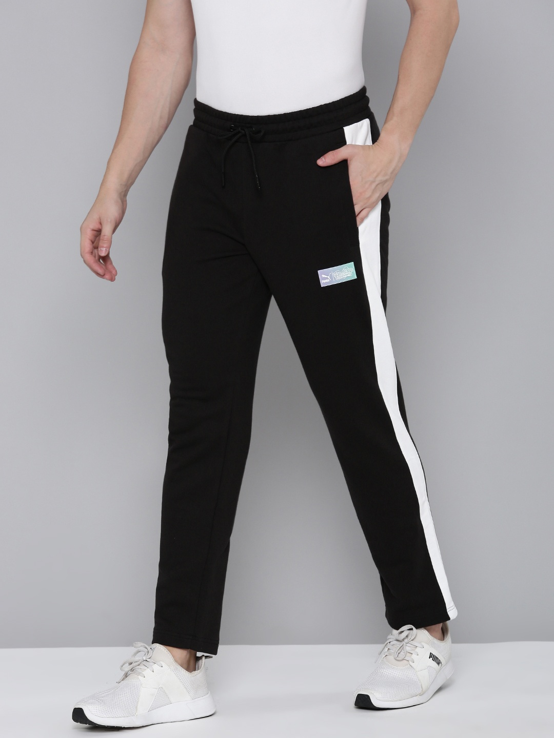 

PUMA X SPONGEBOB T7 Men Pure Cotton Mid Rise Striped Regular fit Outdoor Track Pants, Black