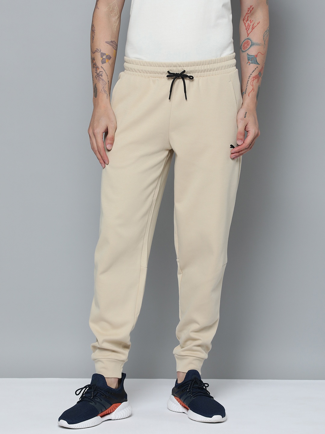 

Puma Men Rad/Cal Mid-Rise Regular Fit Joggers, Beige