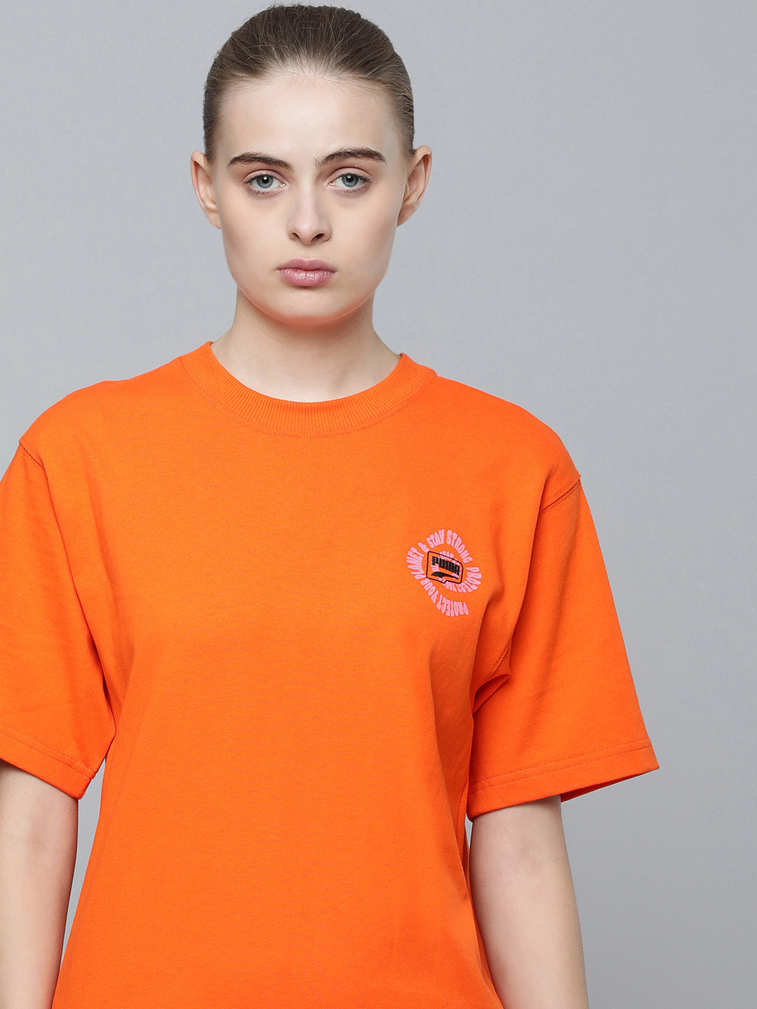 

Puma Women DOWNTOWN Pure Cotton Relaxed Fit Drop-Shoulder Sustainable T-shirt, Orange