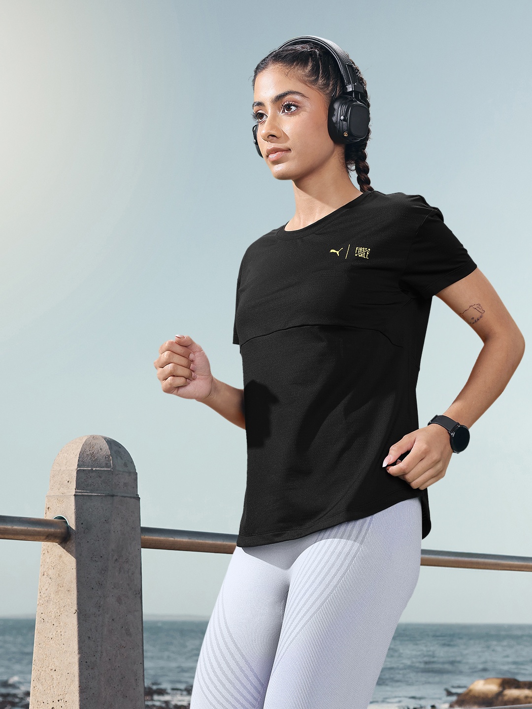 

Puma Women Solid Drycell First Mile Commercial Running T-shirt, Black