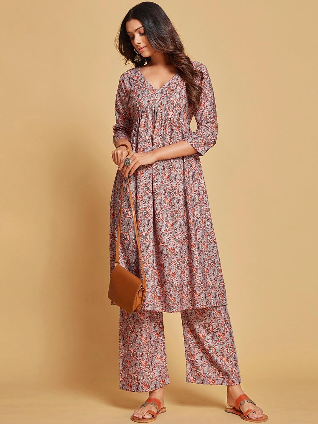 

Ishin Grey & Red Floral Printed V Neck A-Line Kurta With Palazzos