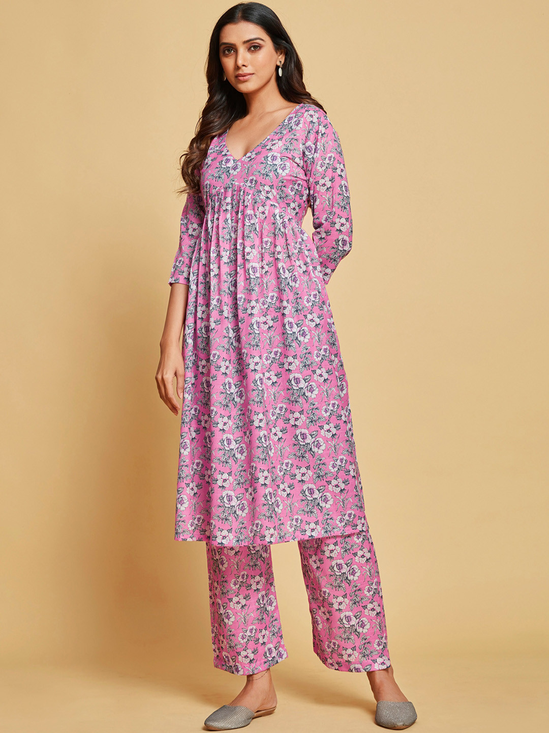 

Ishin Pink & White Floral Printed V Neck A-Line Kurta With Palazzos