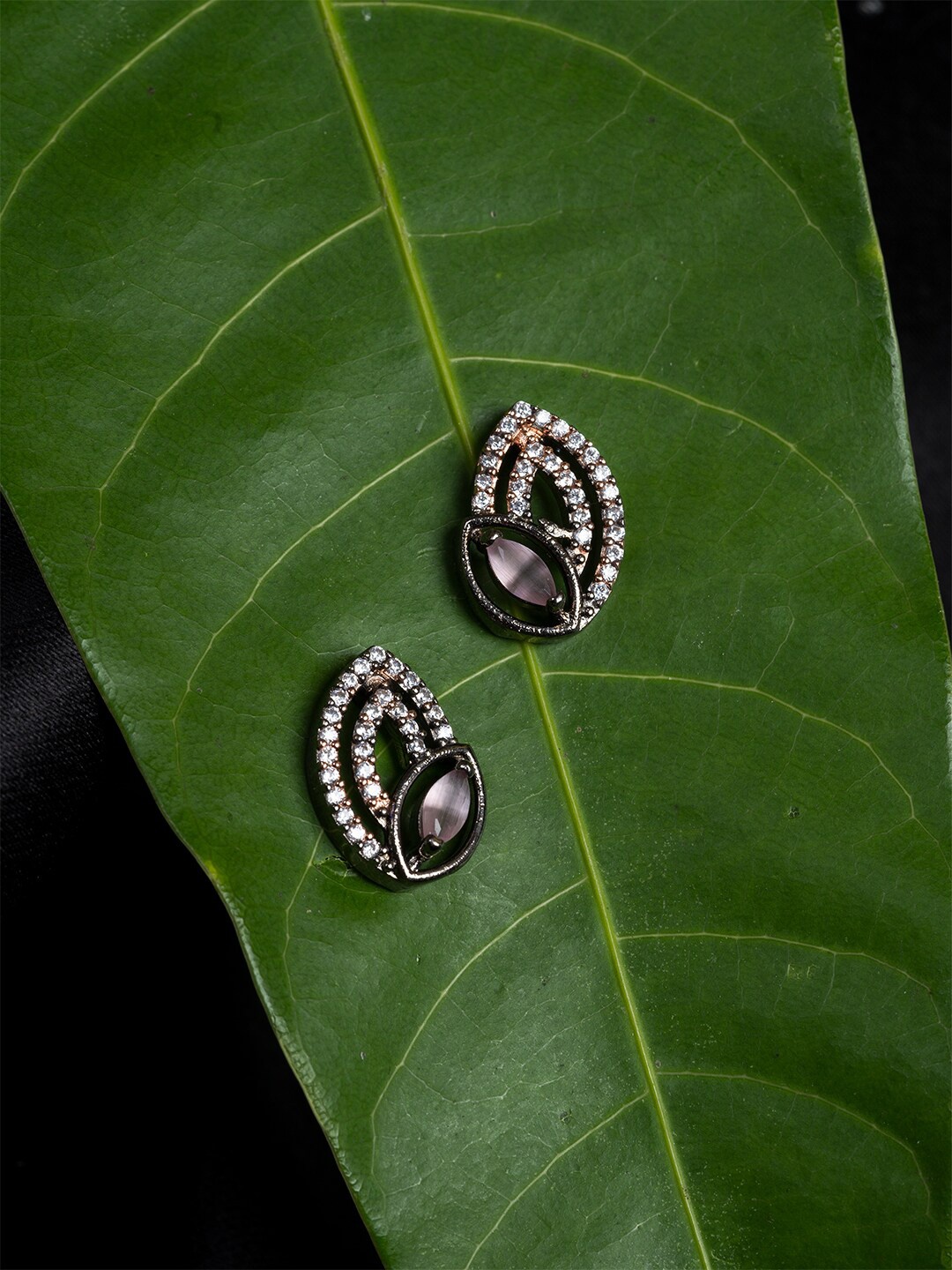 

HOUSE OF ARLI Rhodium-Plated Leaf Shaped Studs Earrings, Silver