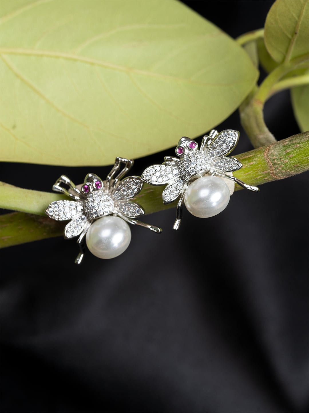 

HOUSE OF ARLI Rhodium-Plated Contemporary Studs Earrings, Silver