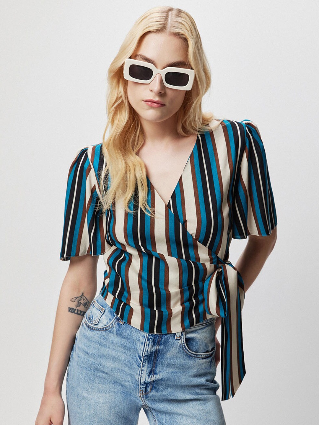 

COVER STORY Blue & Beige Vertical Striped Wrap Top