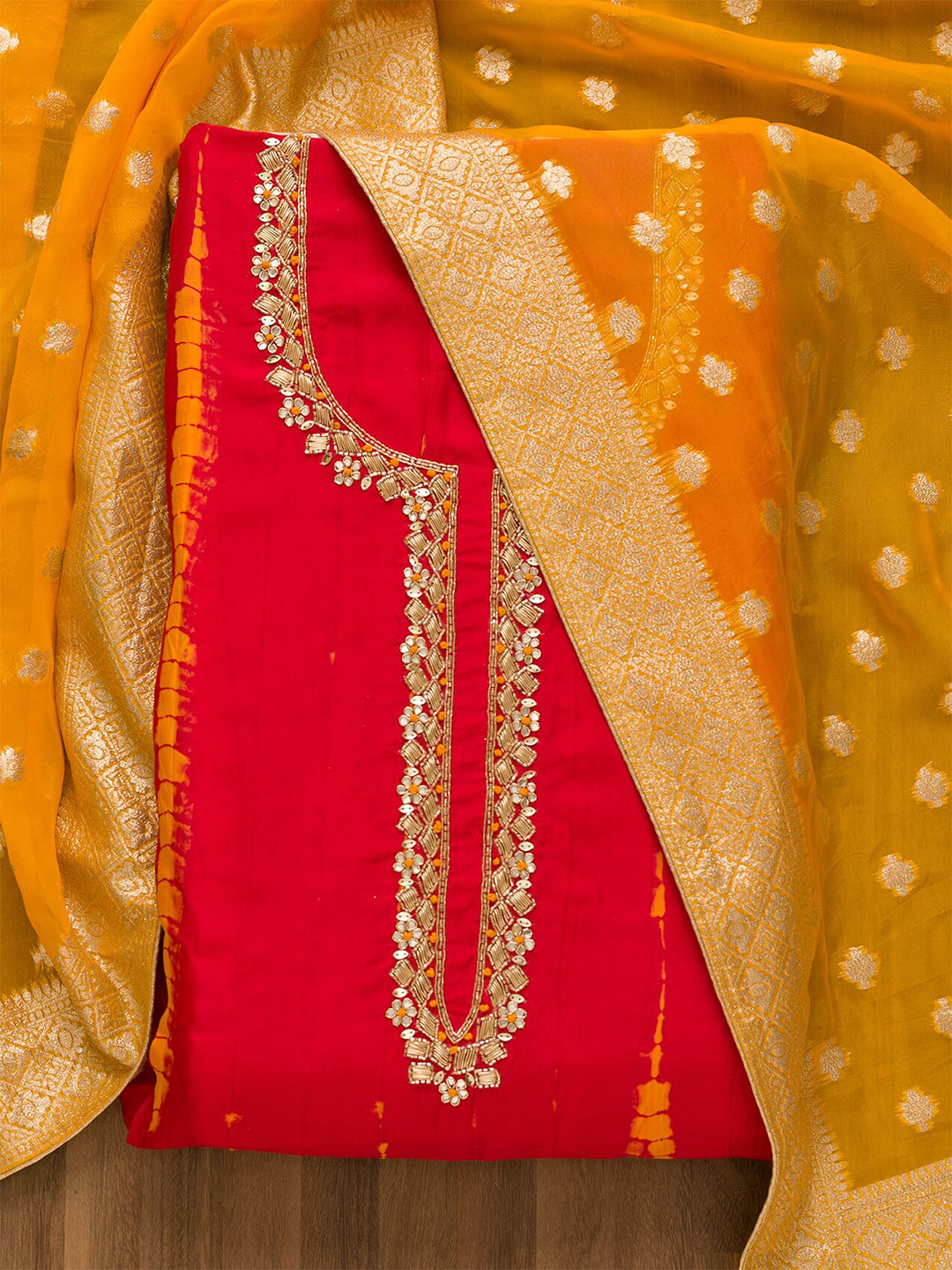 

Koskii Embroidered Semi-Stitched Dress Material, Red