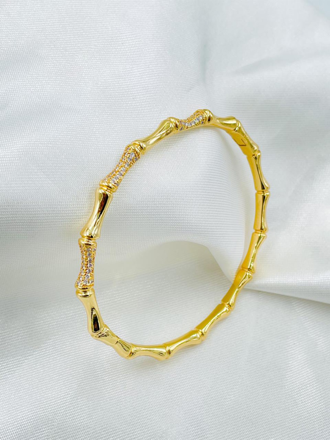 

ZIVOM Women Gold-Plated Cubic Zirconia Kada Bracelet