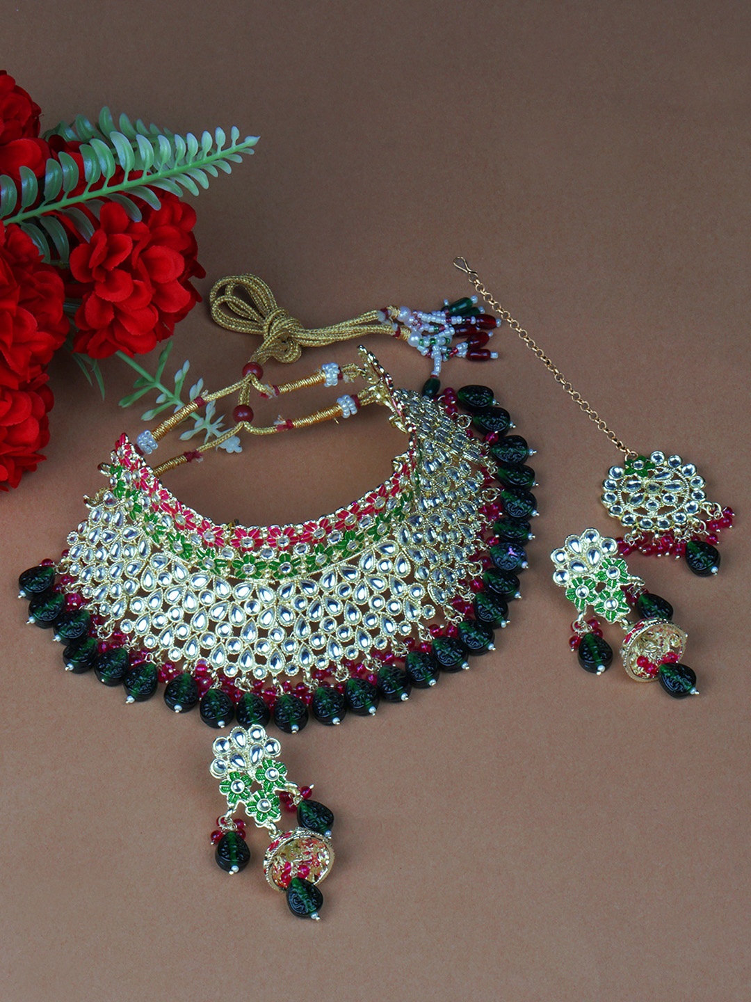 

Matushri Art Gold-Plated Kundan Studded Jewellery Set