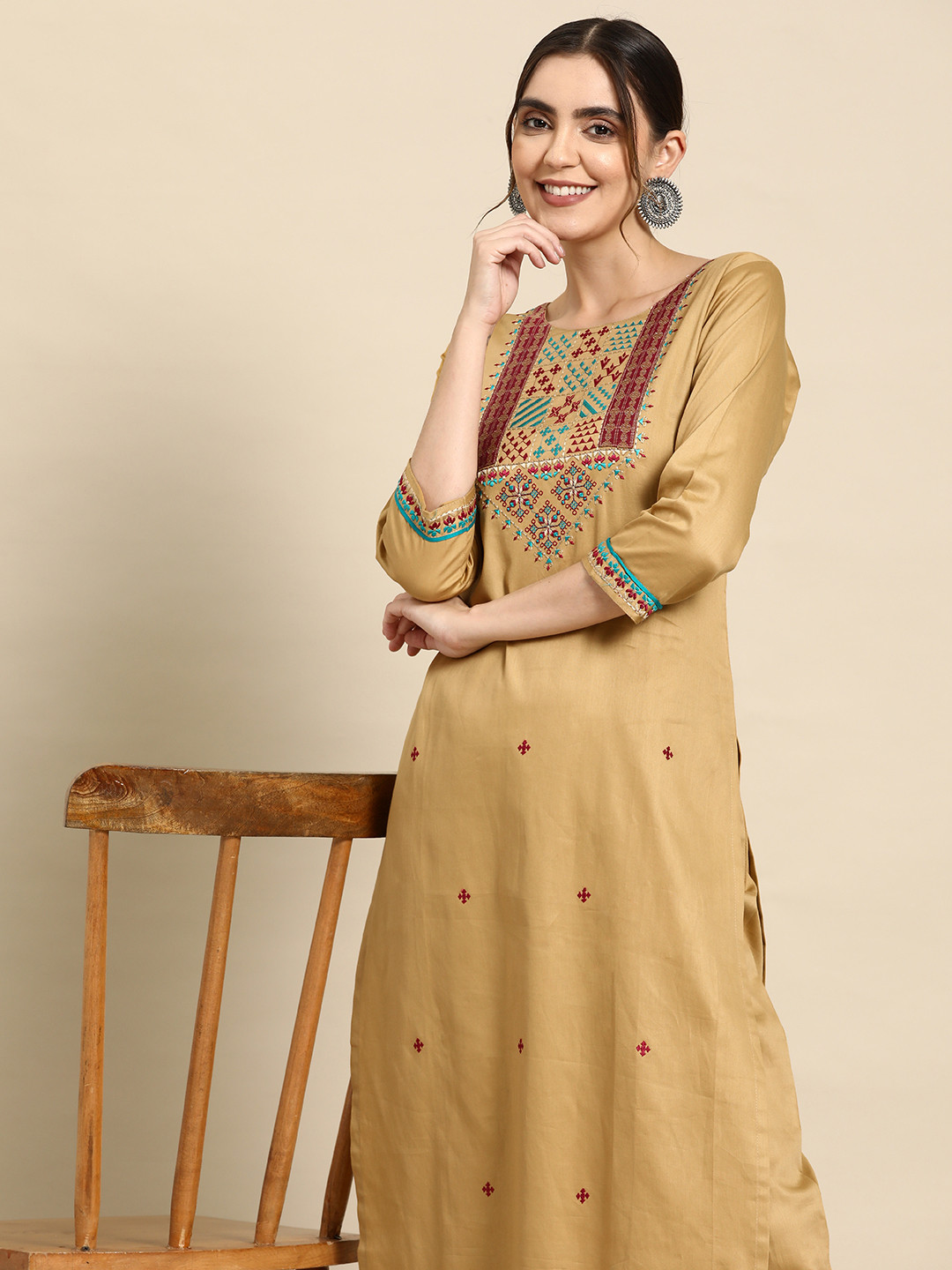 

Sangria Women Ethnic Motifs Yoke Design Regular Thread Work Kurta with Trousers, Beige