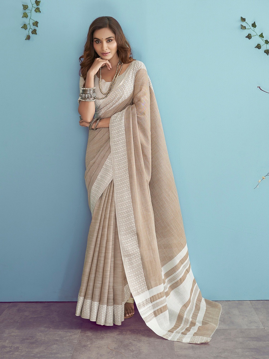 

Mitera Brown & White Linen Blend Saree