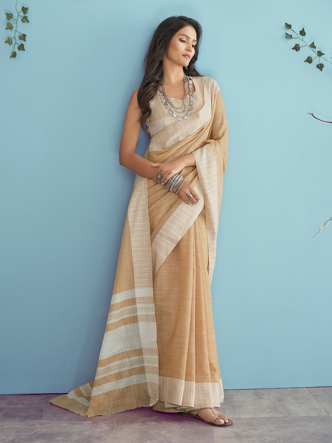 

Mitera Orange & White Woven Design Linen Blend Saree