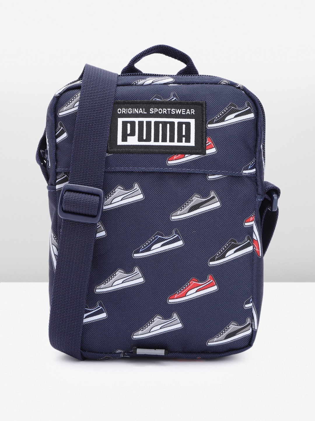 

Puma Unisex Graphic Print Structured Academy Portable Sling Bag With Brand Logo Applique, Navy blue