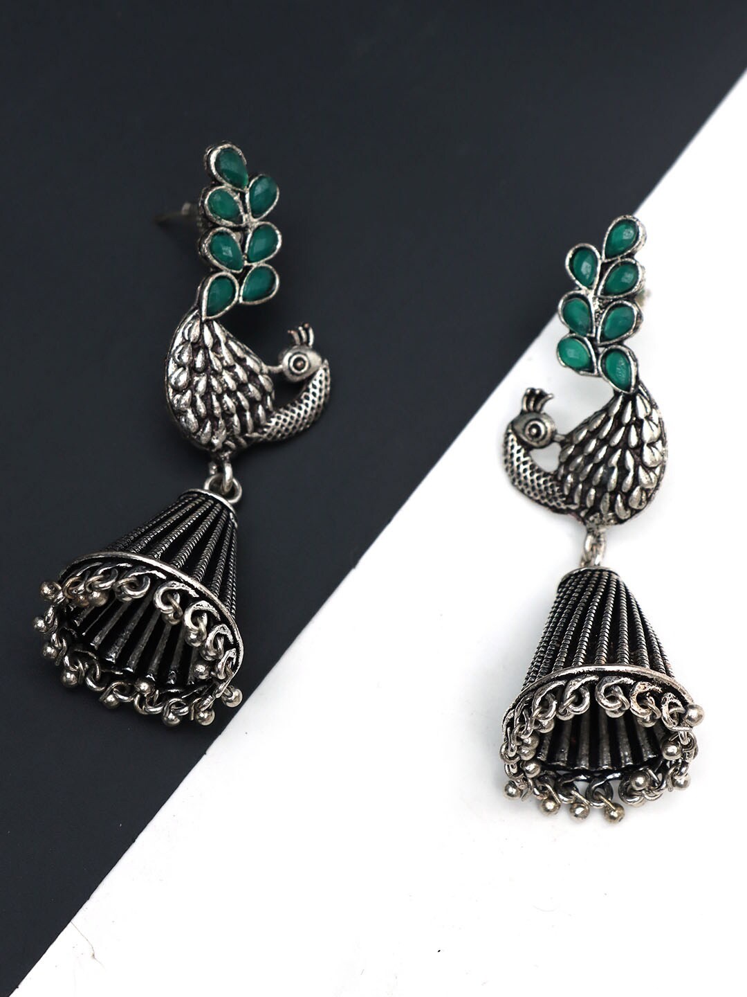 

Ozanoo Silver-Plated Peacock Shaped Jhumkas Earrings