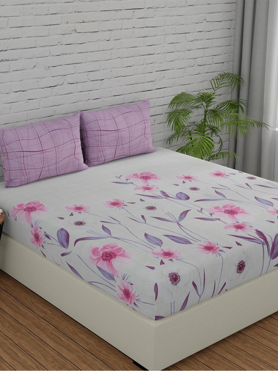 

Huesland Purple & White Floral 144 TC King Bedsheet With 2 Pillow Covers