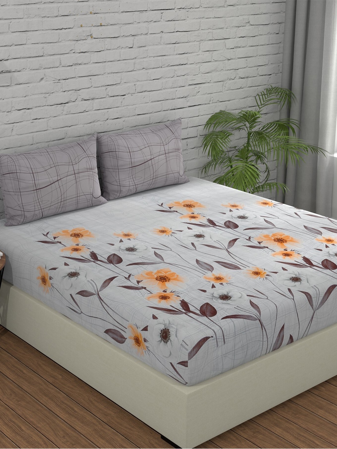 

Huesland Grey & Orange Floral 144 TC King Bedsheet with 2 Pillow Covers