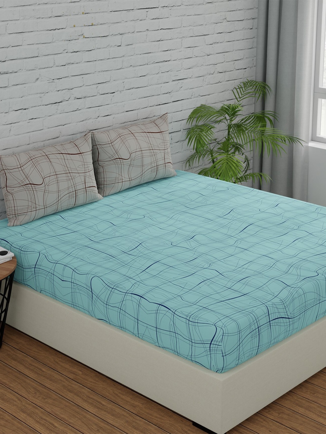

Huesland Teal & Grey Printed 144 TC Queen Bedsheet With 2 Pillow Covers