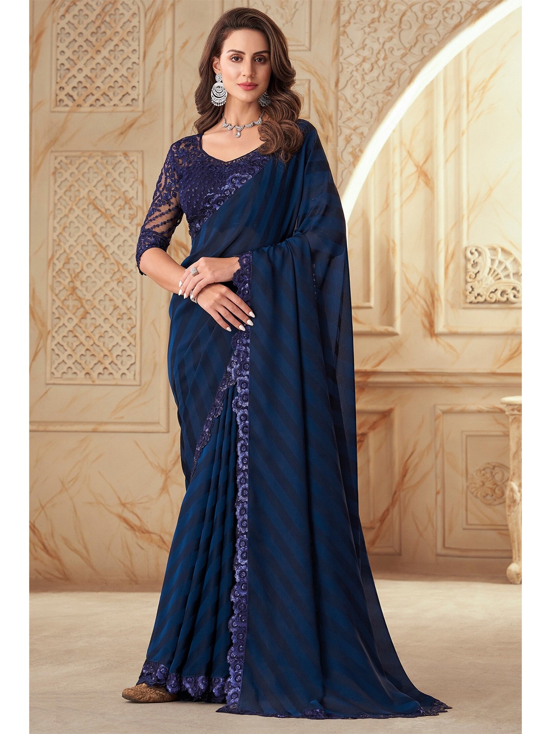 

Mitera Navy Blue Striped Embroidered Saree