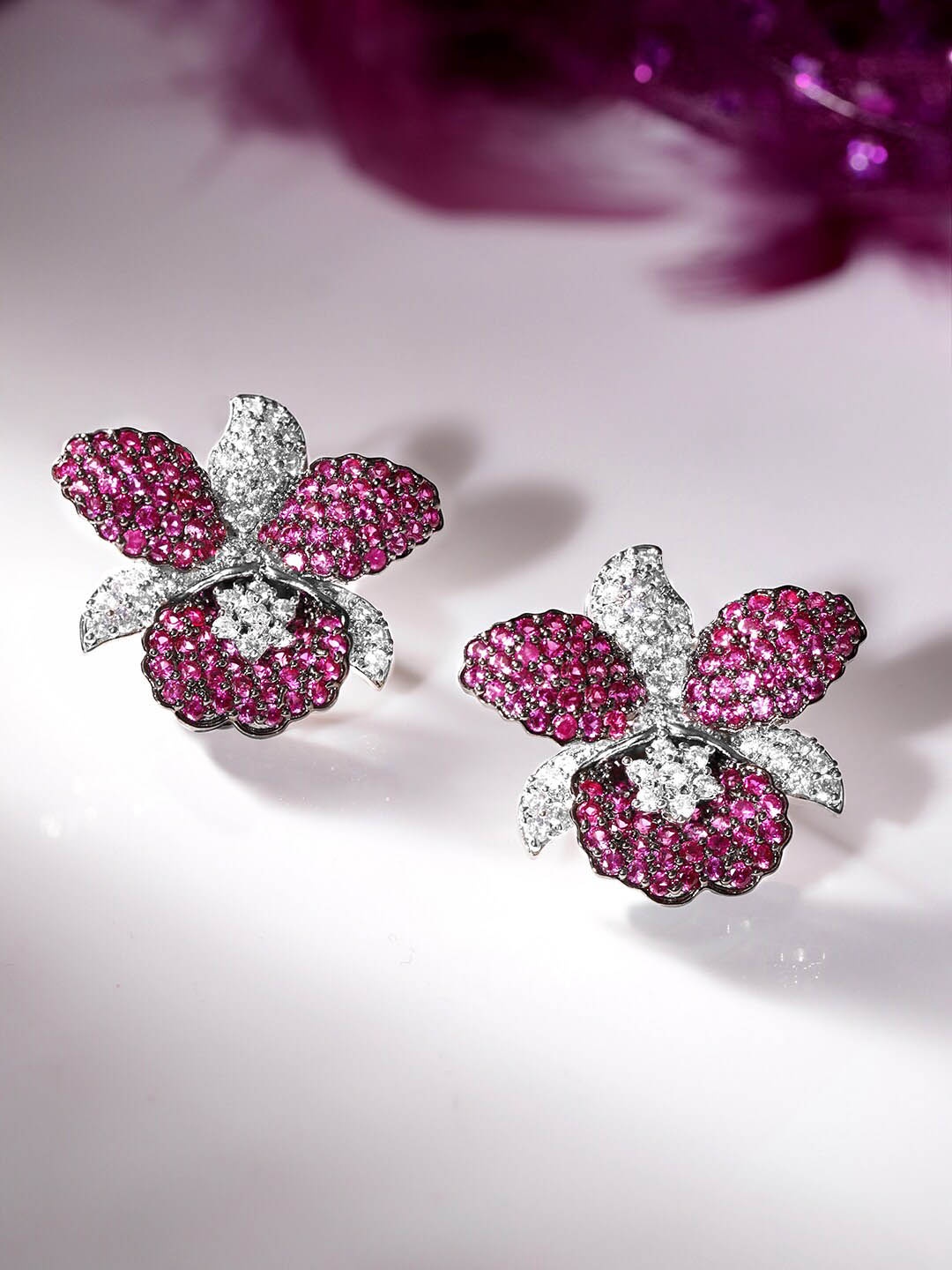

Rubans Rhodium Plated Pink Sapphire & White Cubic Zicronia Studded Premium Stud Earrings, Silver