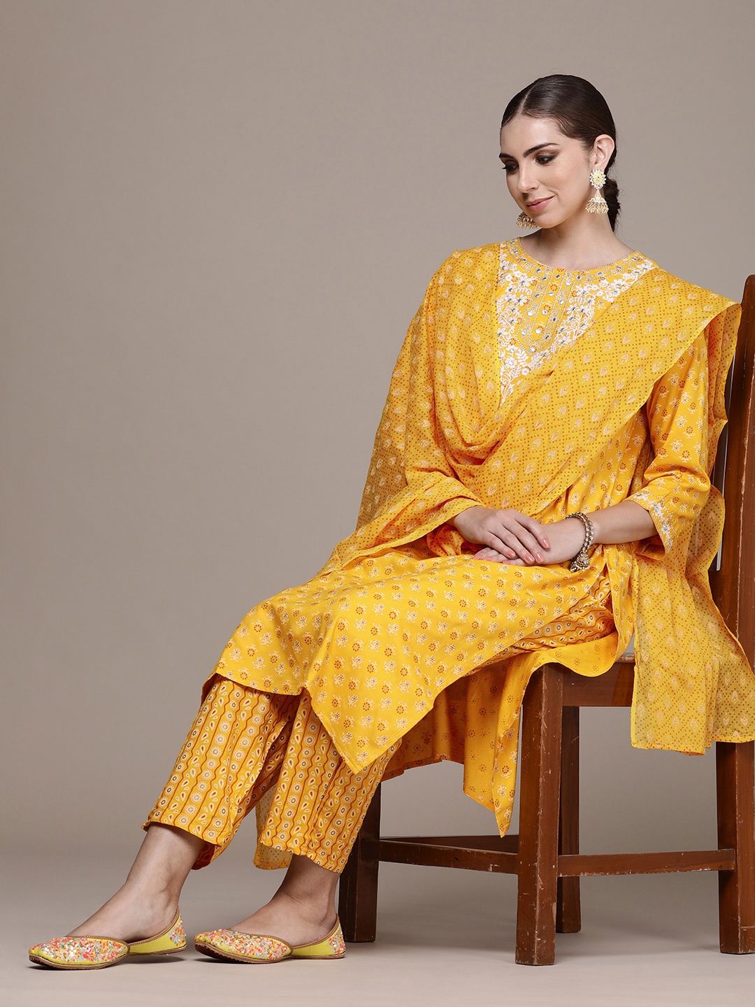 

Anouk Women Floral Yoke Design Regular Mirror Work Kurta with Trousers & With Dupatta, Mustard