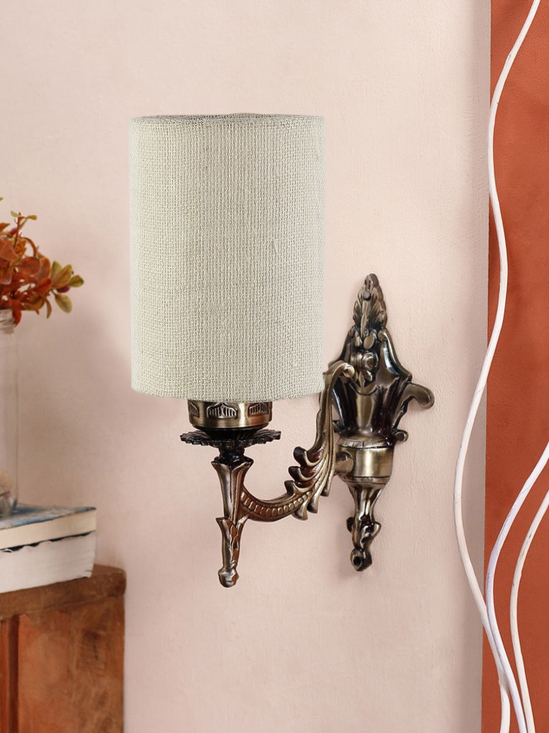 

Devansh White Textured Antique Wall Lamp With Jute Conical Shade