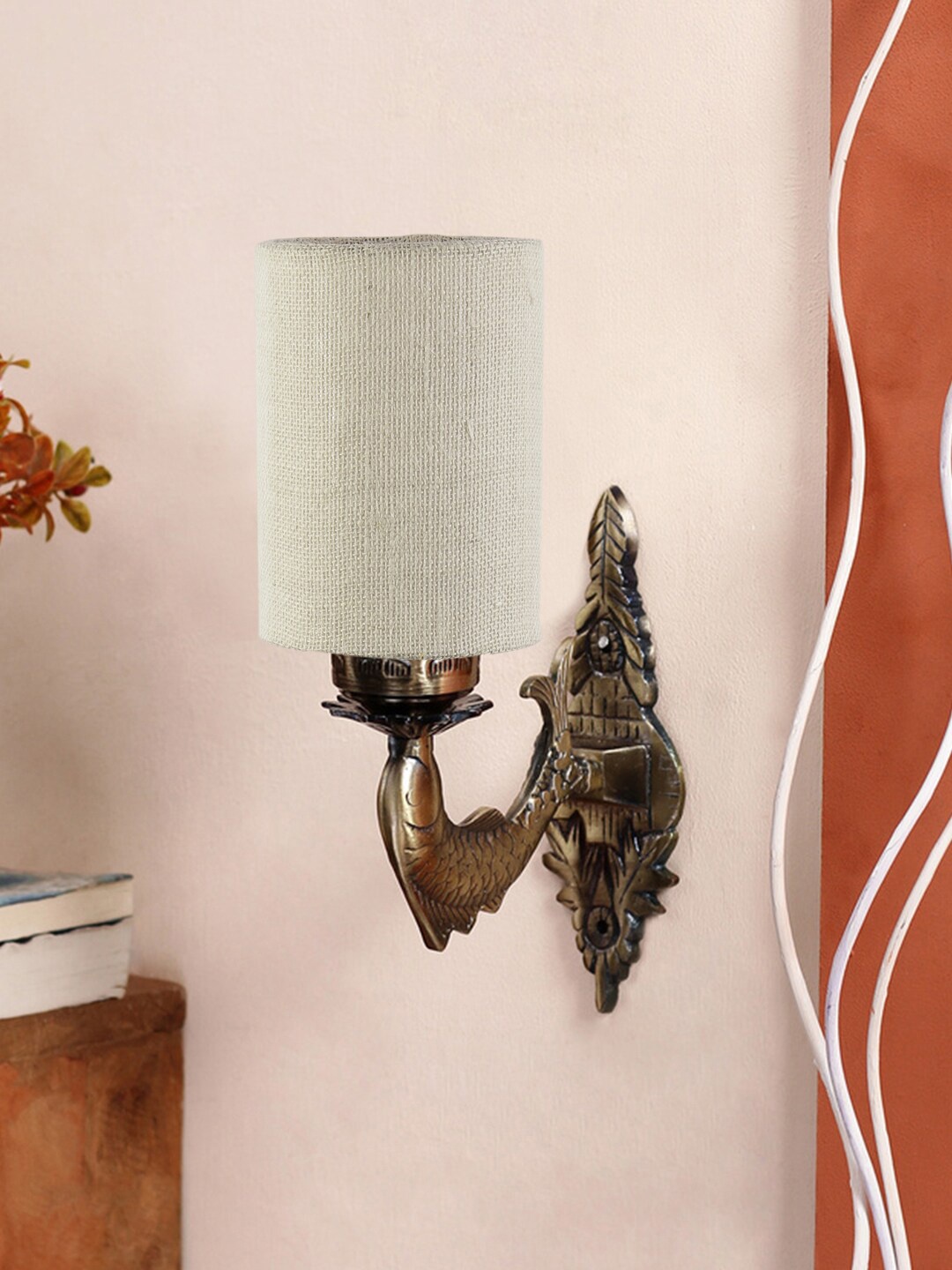 

Devansh Off White & Gold Toned Antique Wall Lamp With Jute Conical Shade