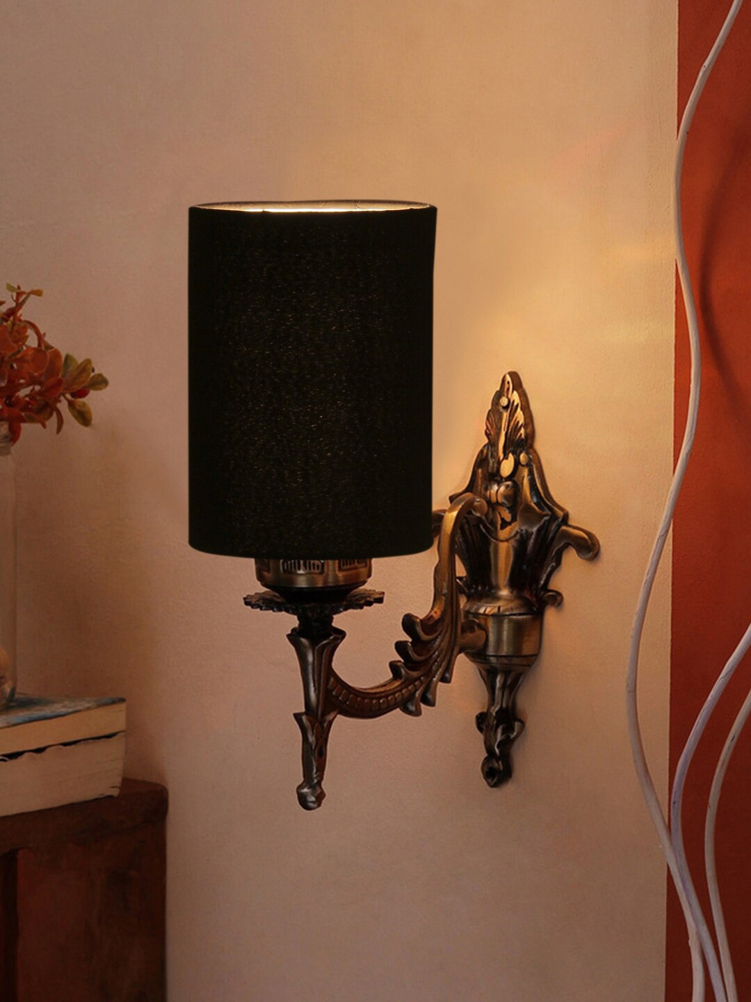 

Devansh Black & Gold Toned Antique Wall Lamp With Cotton Conical Shade