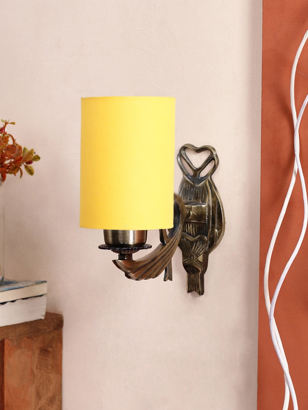 

Devansh Yellow & Gold Toned Textured Antique Wall Lamp With Cotton Conical Shade