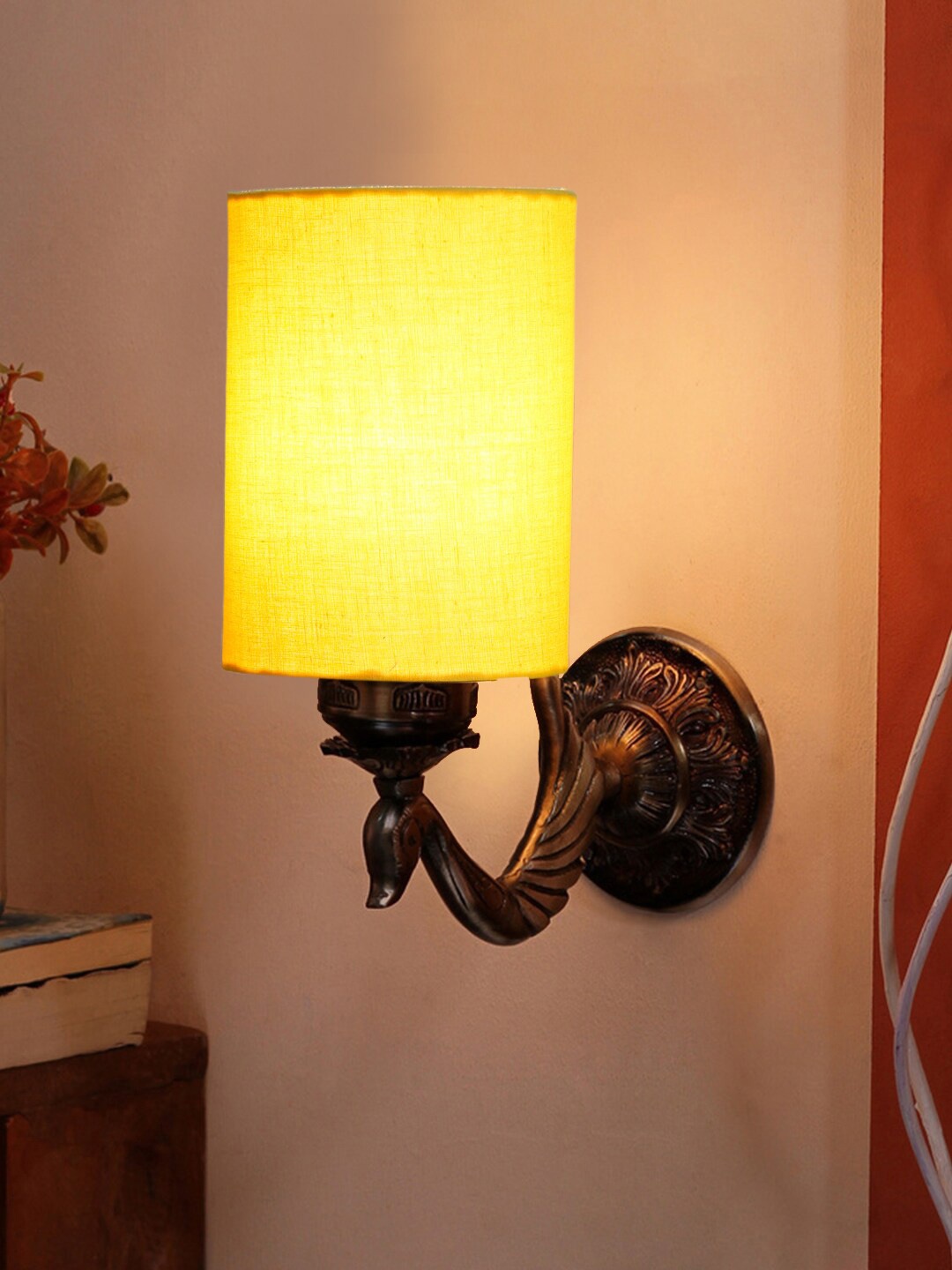 

Devansh Yellow & Gold Toned Textured Antique Wall Lamp With Cotton Conical Shade