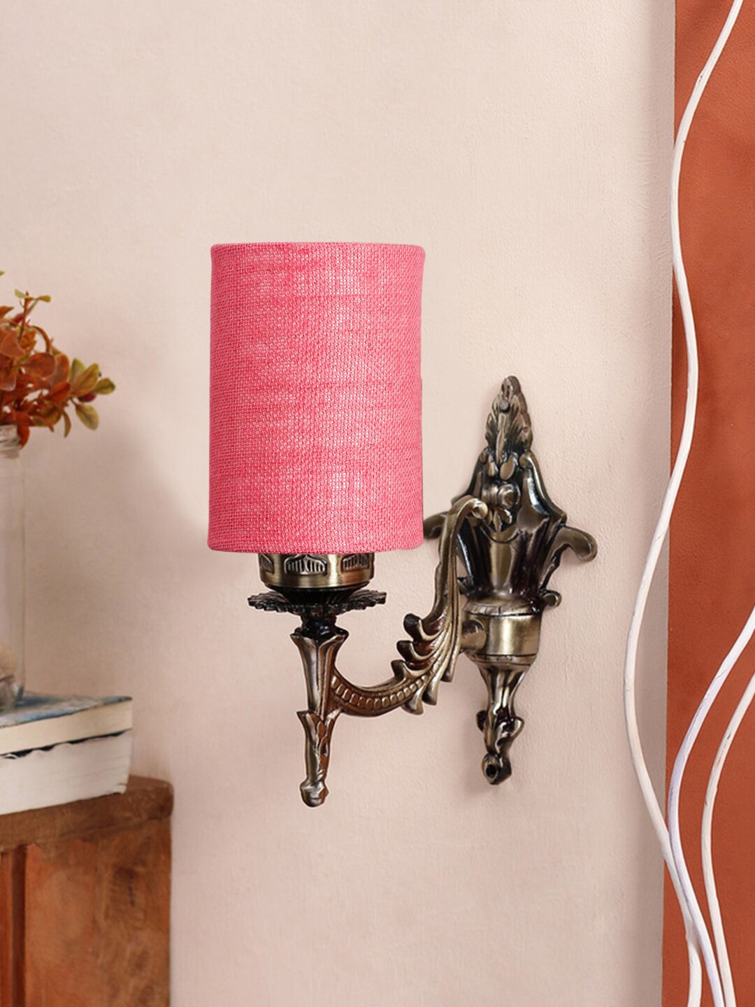 

Devansh Pink & Gold Toned Textured Antique Wall Lamp With Jute Conical Shade