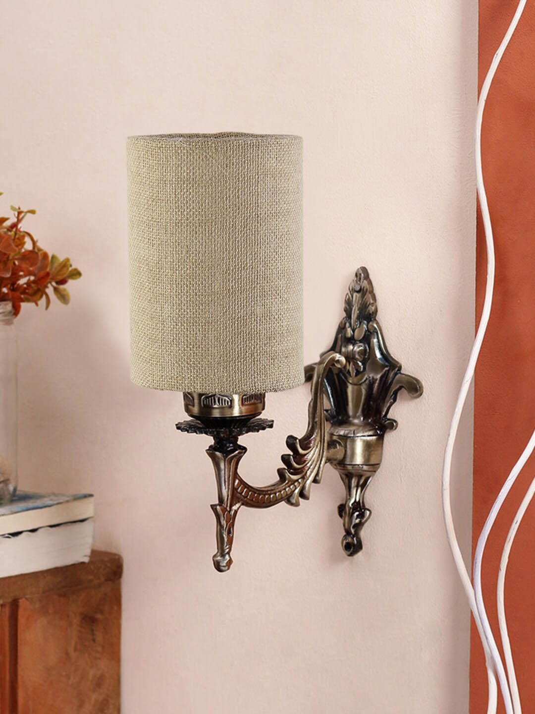 

Devansh Beige & Gold Toned Antique Wall Lamp With Jute Conical Shade