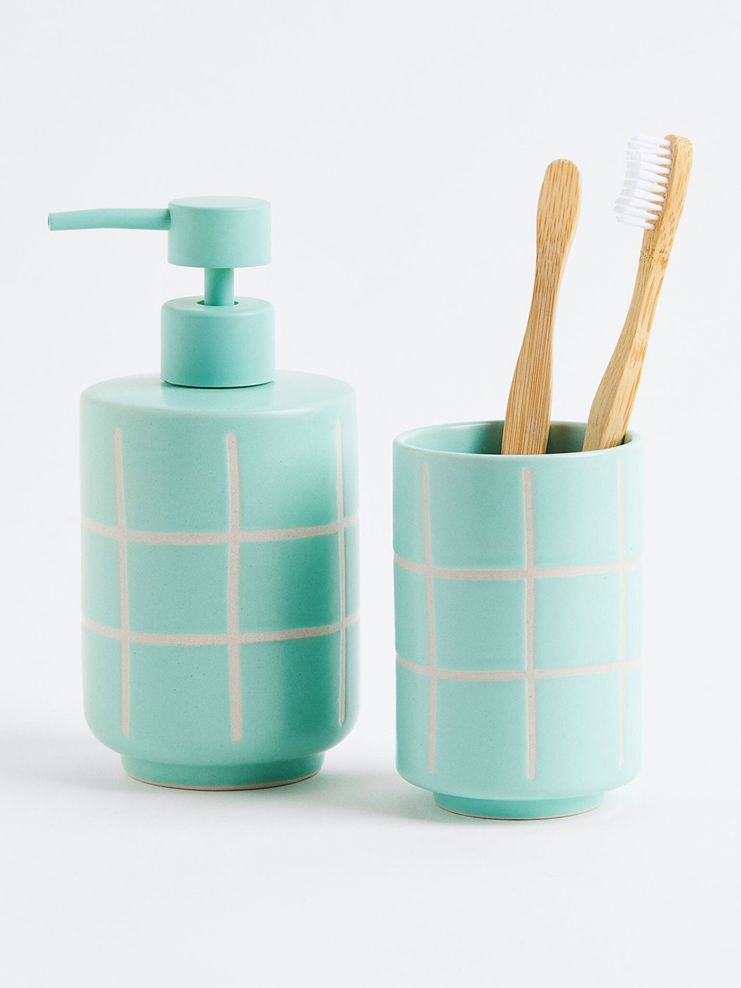 

H&M Turquoise Blue & White Stoneware Toothbrush Mug