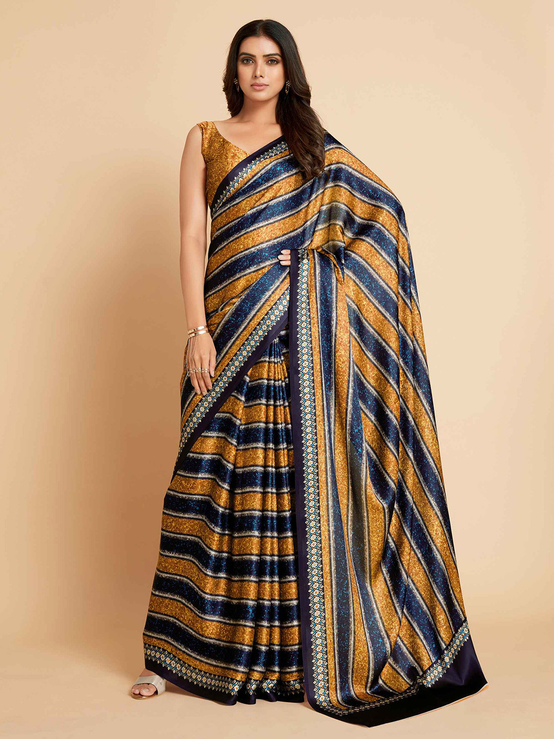 

Ishin Orange & Navy Blue Striped Satin Saree