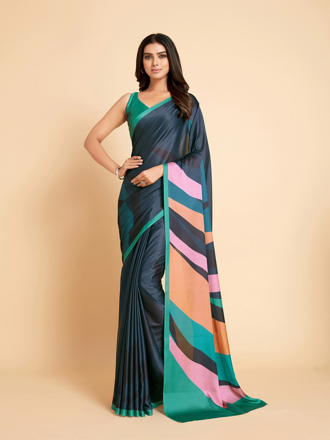 

Ishin Navy Blue & Sea Green Striped Satin Saree