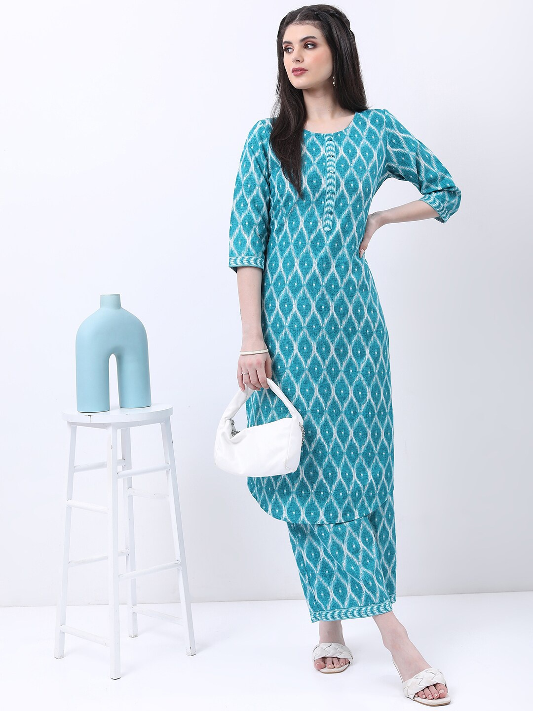 

KETCH Ethnic Motifs Printed Curved Hem Regular Kurta with Palazzos, Turquoise blue