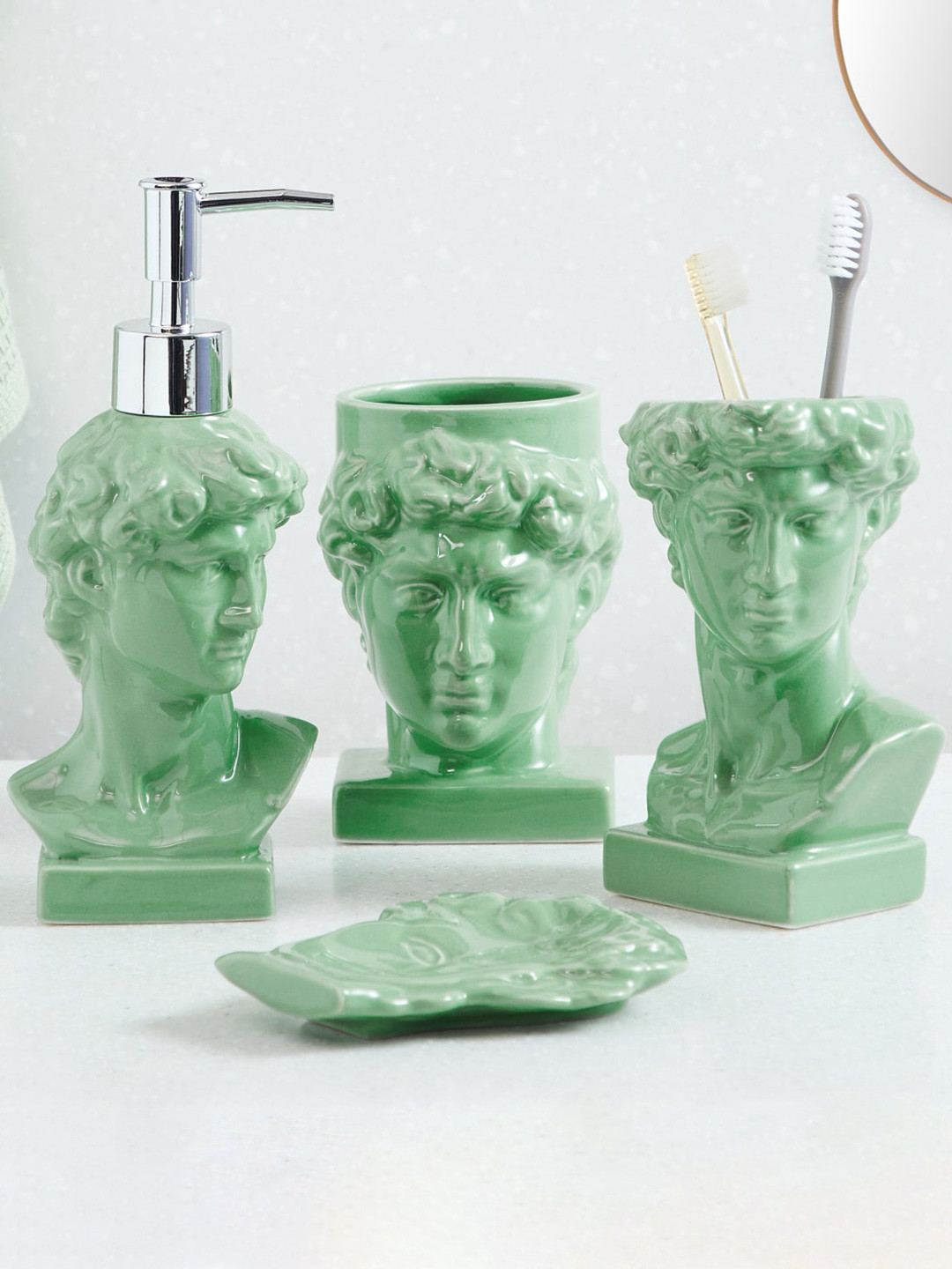 

Home Centre Nova Roman Empire Green Face Shaped Ceramic Tumbler-200 ml