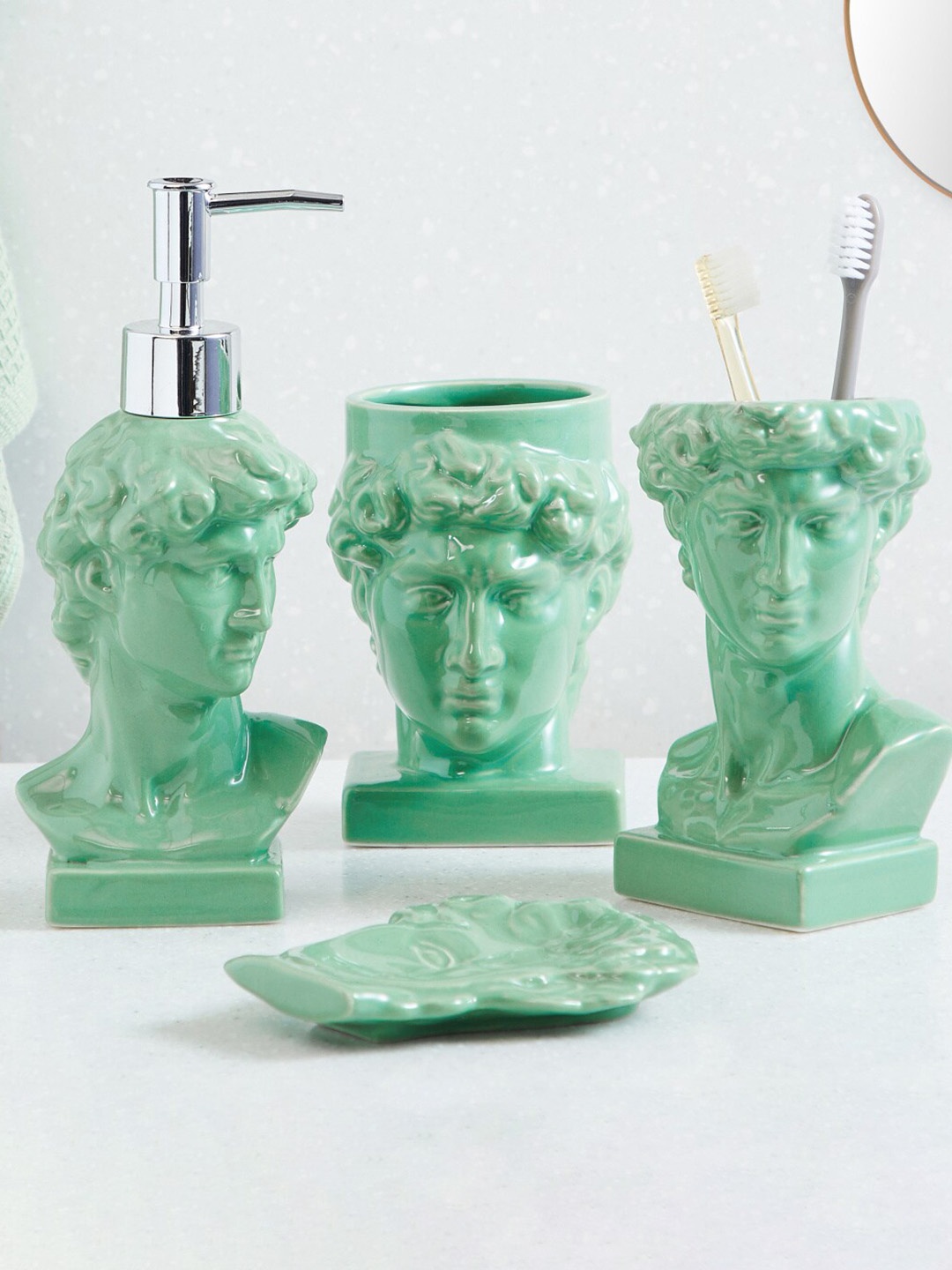 

Home Centre Nova Roman Empire Green Face Shaped Ceramic Toothbrush Holder - 200 ml