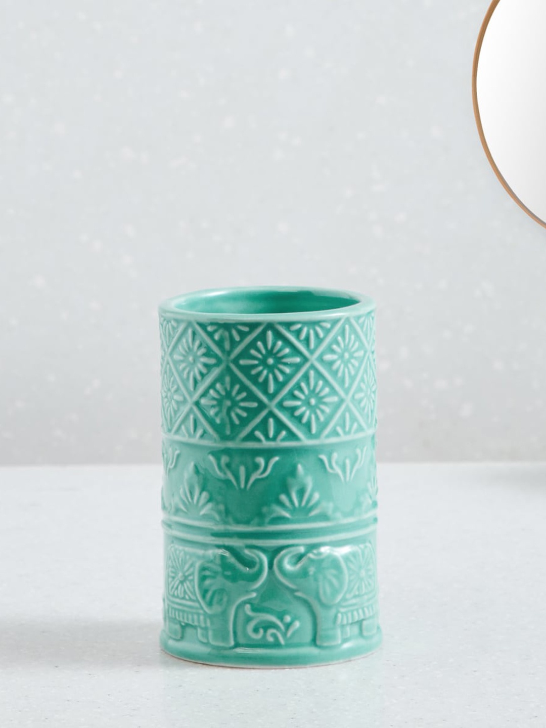 

Home Centre Nova Hoovu Blue Textured Ethnic Motif Design Ceramic Tumbler
