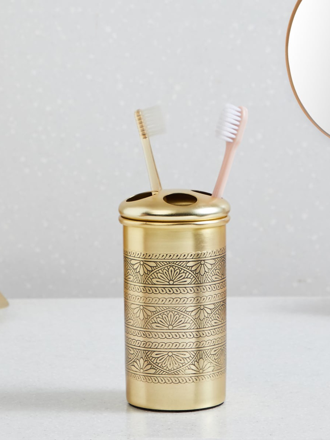 

Home Centre Nova Hoovu Gold-Toned Ethnic Motif Design Metal Toothbrush Holder