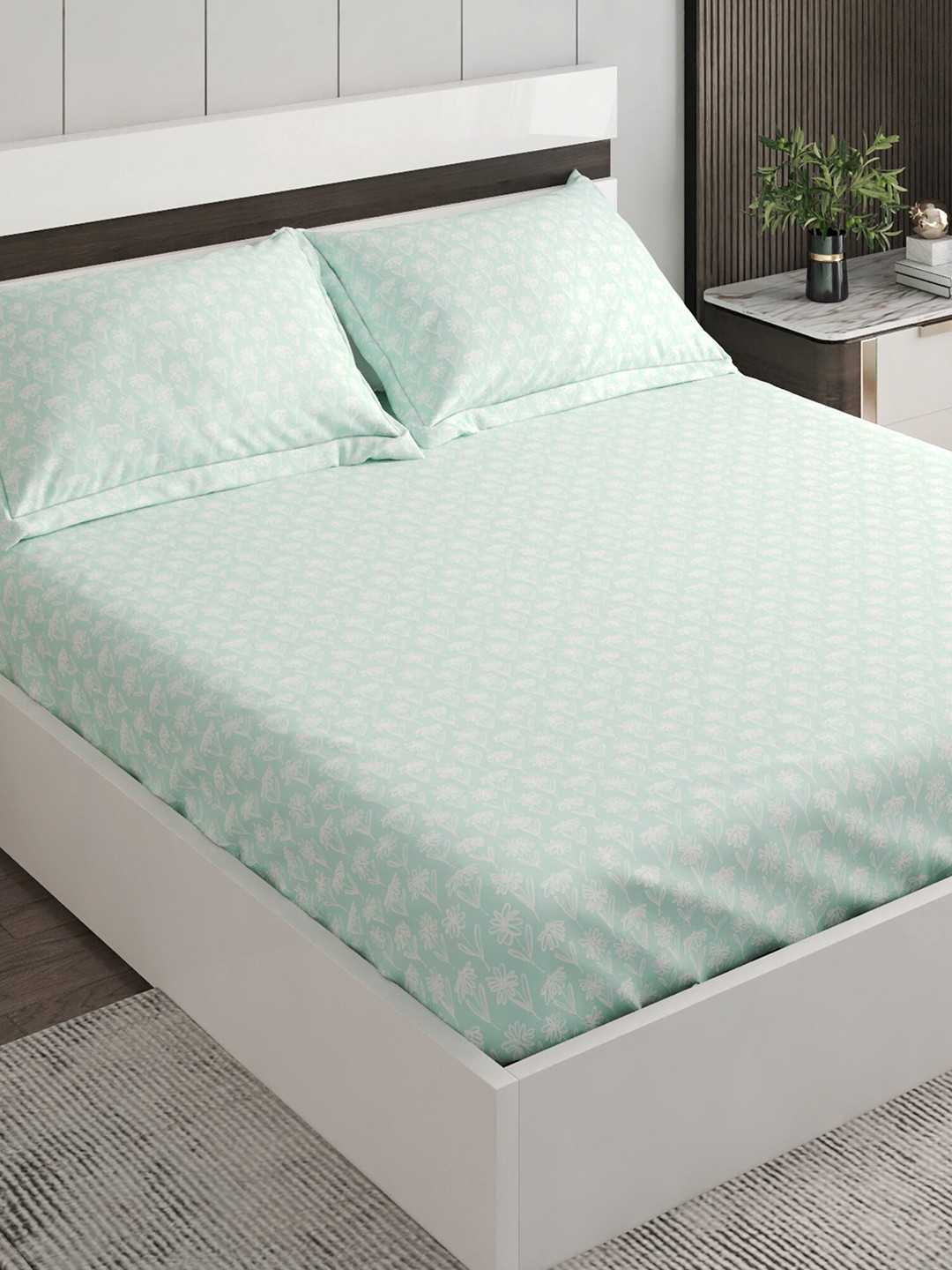 

Home Centre Teal & White Floral 144 TC Cotton King Bedsheet With 2 Pillow Covers